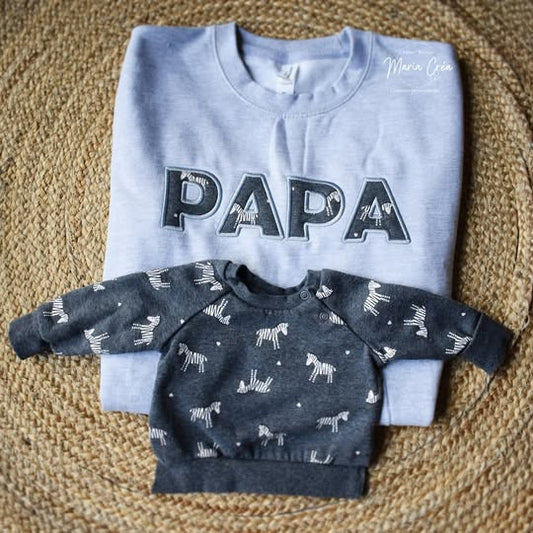 Pull brodé souvenirs avec les textiles de vos enfants