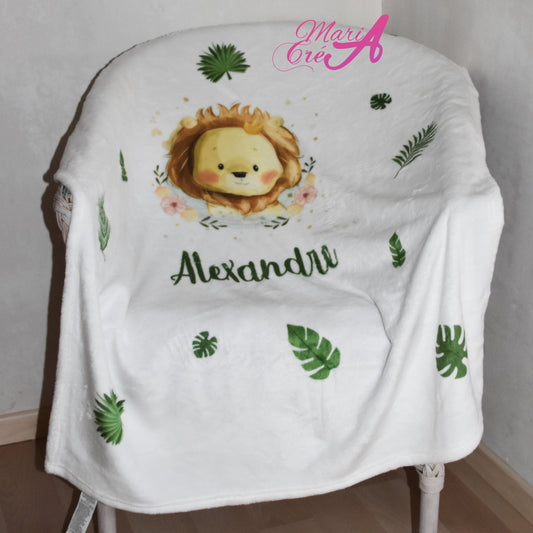 Couverture lion feuilles savane