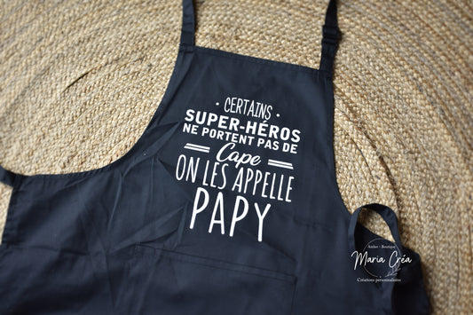 Tablier "Certains super héros ne portent pas de cape, on les appelle ..."