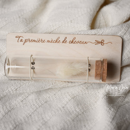 Support fiole pour premières mèches de cheveux.